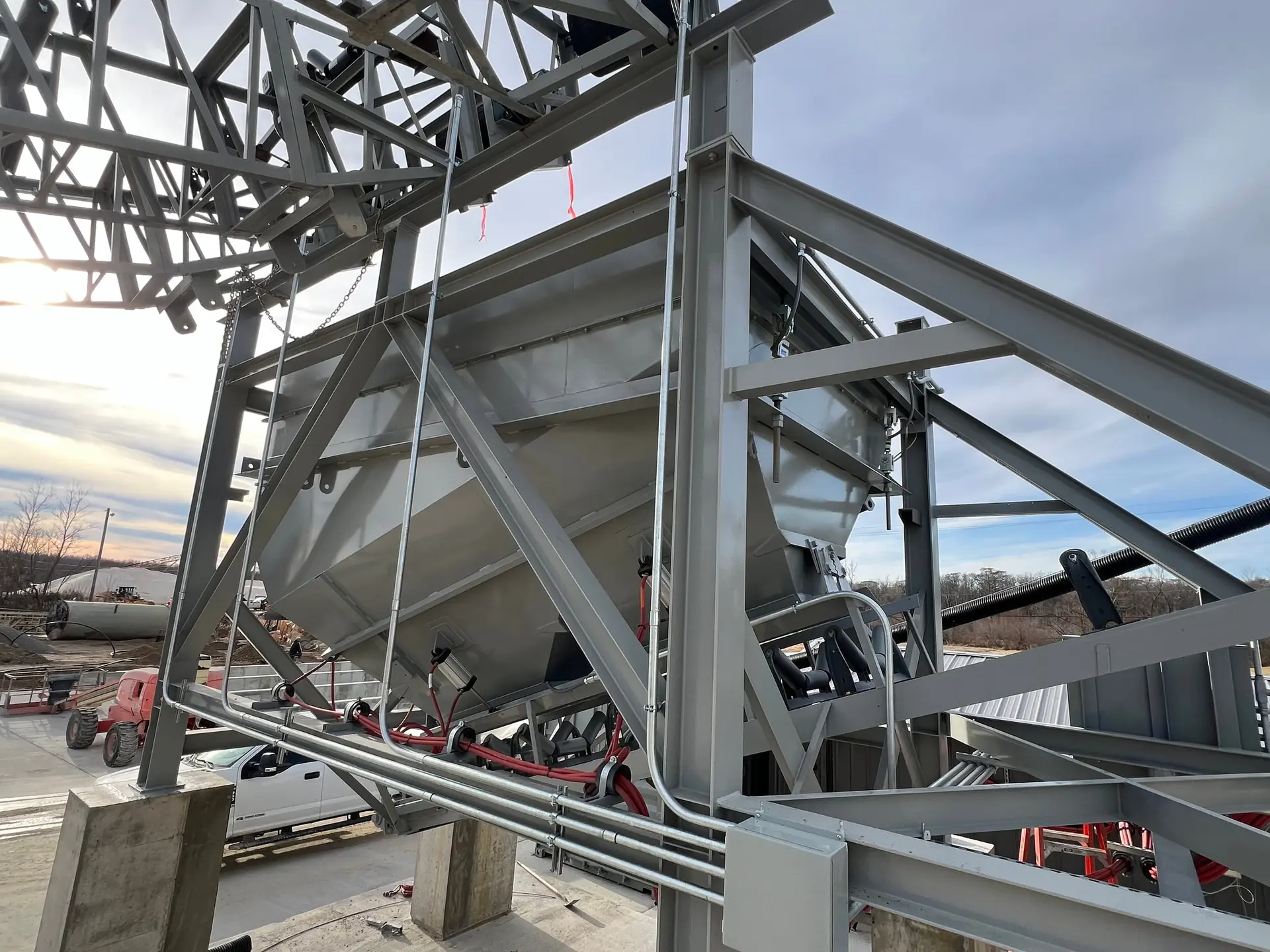 Industrial conduit installation on a steel structure by LiveWire Electrical Service